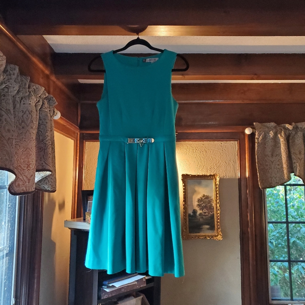 Jennifer Lopez teal knee length dress